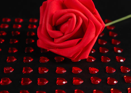Red rose and heart gems bundle Stock Photos