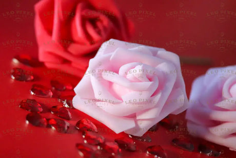 Close-up of delicate roses and scattered heart gems bundle Stock Photos