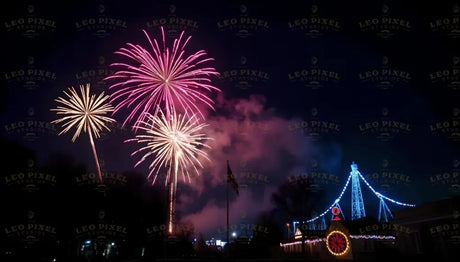 Brilliant fireworks light up the dark sky in vibrant bursts of pink and gold, perfectly complementing the glowing bridge adorned with festive lights. The sparkling display reflects off the surrounding scenery, creating a breathtaking blend of man-made and natural beauty. This captivating celebration showcases the harmony of tradition and modernity. Ai generated image.