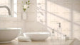 A sleek bathroom counter with a modern design features two white ceramic basins, a rolled white towel, and clear glass soap dispensers. Soft sunlight streams through a nearby window, casting gentle shadows on the tiled wall. A single white flower in a simple vase adds a natural touch, complementing the clean, bright, and minimalist aesthetic of the space. Ai generated. Photography style.