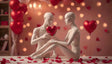 Two elegant white mannequins sit in a serene, intimate pose on a table adorned with scattered red petals. One holds a glossy red heart balloon, symbolizing love, as they gaze tenderly at each other. The warm ambiance is enhanced by a soft bokeh of glowing lights and vibrant red balloons, creating a dreamy, romantic atmosphere that speaks of connection and affection amidst delicate surroundings. Ai generated. Photography style.